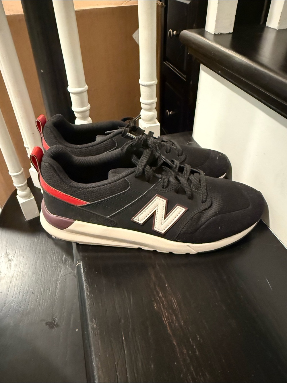 New Balance Men's 009 Black Sneakers with Red  Accents